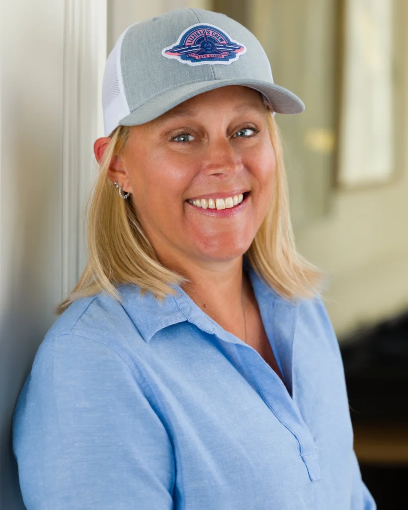 Liz Childers wearing a LizzieLu logo hat